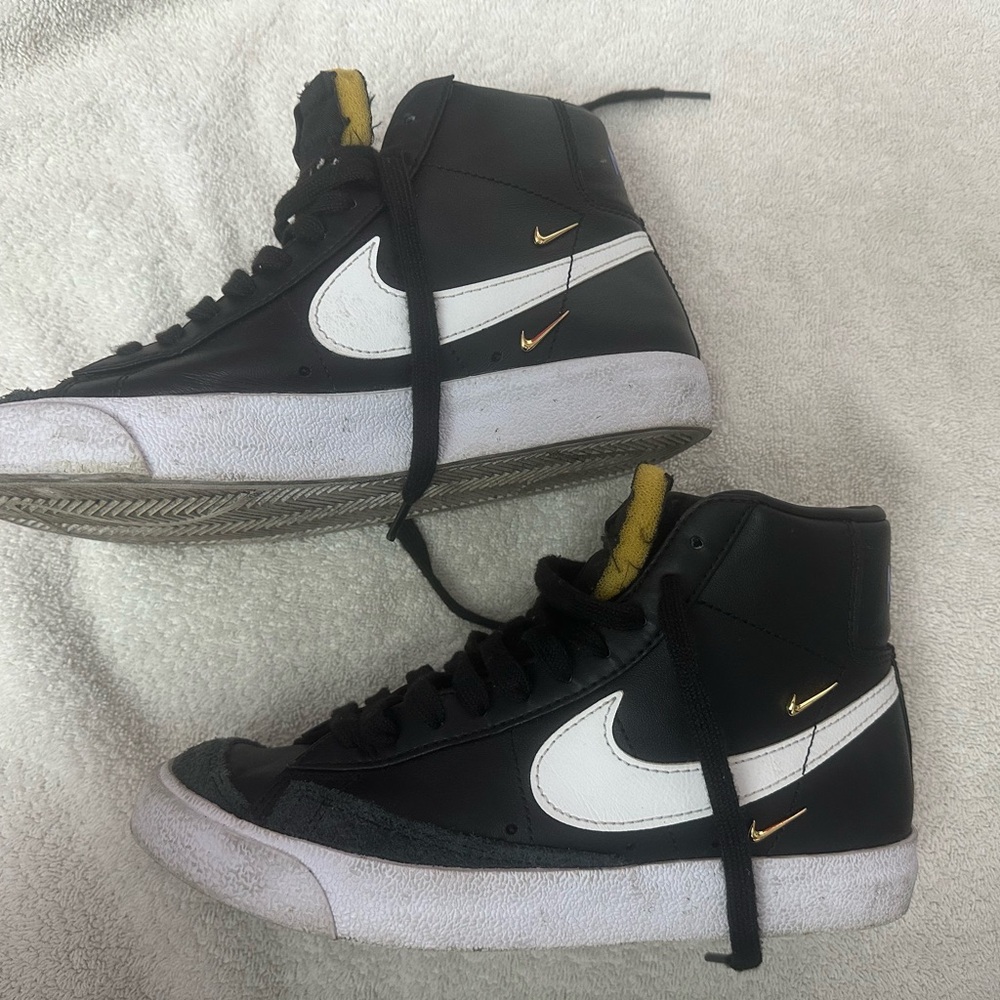 Nike Black and White Blazers neaker with Gold Details and distressed tongue